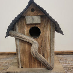 Bird House Red tin roof with stick